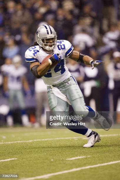 Running back Marion Barber of the Dallas Cowboys runs with the ball during a game against the New Orleans Saints at Texas Stadium on December 10,...