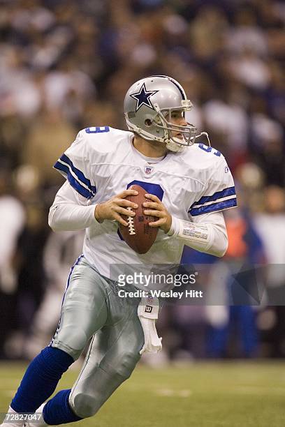 Quarterback Tony Romo of the Dallas Cowboys looks down field to pass the ball against the New Orleans Saints at Texas Stadium on December 10, 2006 in...