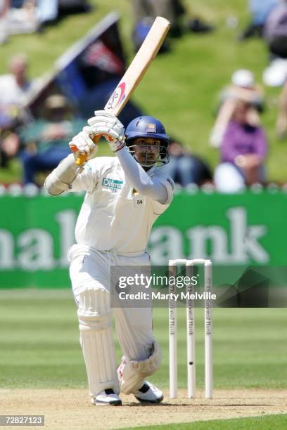 Kumar Sangakkara of Sri Lanka hits a four during day one of the second test match between New Zealand and Sri Lanka at the Basin Reserve December 15,...