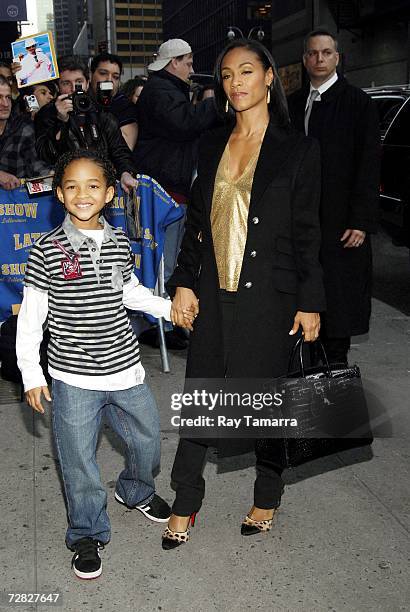 Actors Jaden Smith and Jada Pinkett Smith arrive at the Ed Sullivan Theater for a taping of the ''Late Show with David Letterman'' on December 14,...