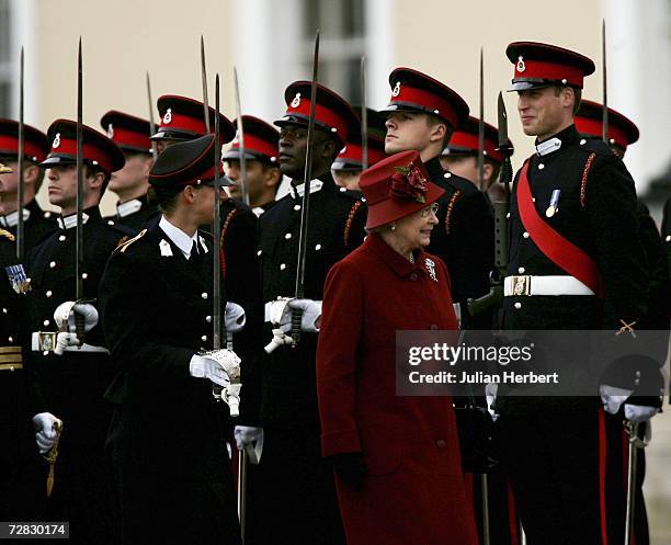 Prince William is inspected by his grandmother HM Queen Elizabeth II as he takes part in The Sovereigns Parade at The Royal Military Academy...