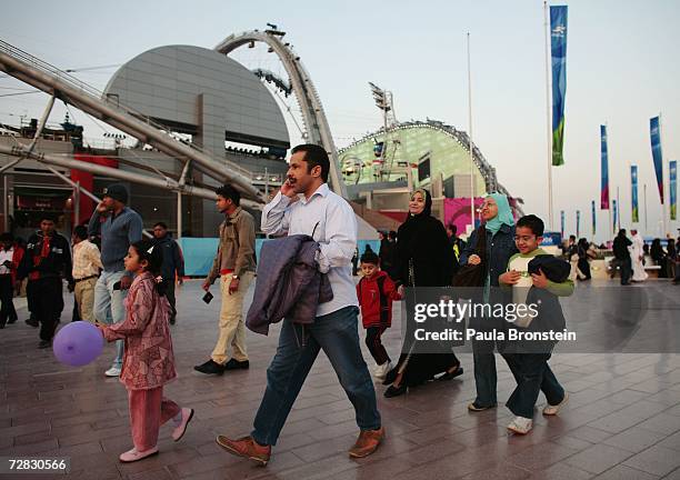 Spectators arrive for the Closing Ceremony of the 15th Asian Games Doha 2006 at the Khalifa Stadium on December 15, 2006 in Doha, Qatar.