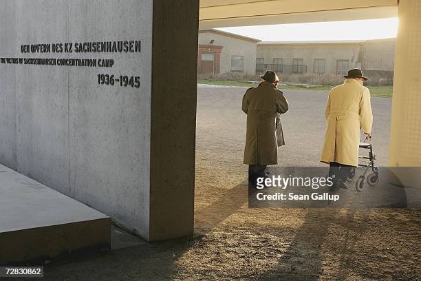 Roma, , survivors of the Holocaust Josef Seeger and Rudolf Steinbach leave a ceremony at the former concentration camp at Sachsenhausen on December...