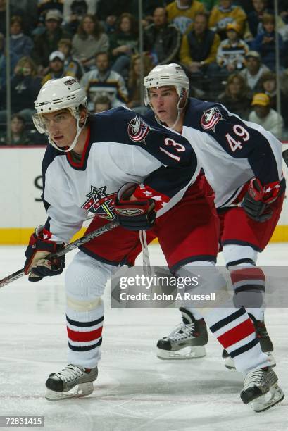 Nikolai Zherdev and Dan Fritsche of the Columbus Blue Jackets eye the play against the Nashville Predators at Gaylord Entertainment Center on...