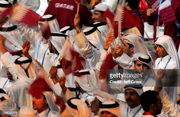 Qatari athletes enter the stadium during the Closing Ceremony of the 15th Asian Games Doha 2006 at the Khalifa Stadium on December 15, 2006 in Doha,...