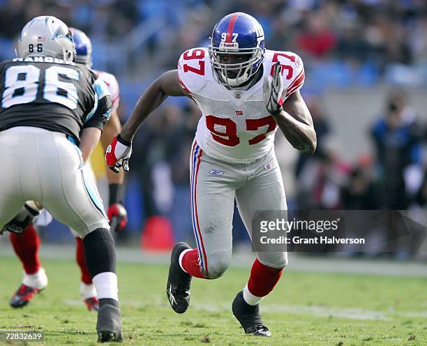 Mathias Kiwanuka of the New York Giants runs on the field during the game against the Carolina Panthers on December 10 at Bank of America Stadium in...