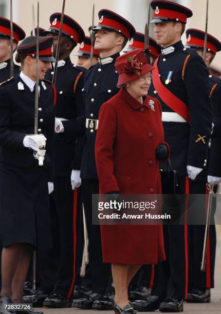 Prince William is inspected by his grandmother, Queen Elizabeth ll, as he takes part in the Sovereign's Parade at the Royal Military Academy...