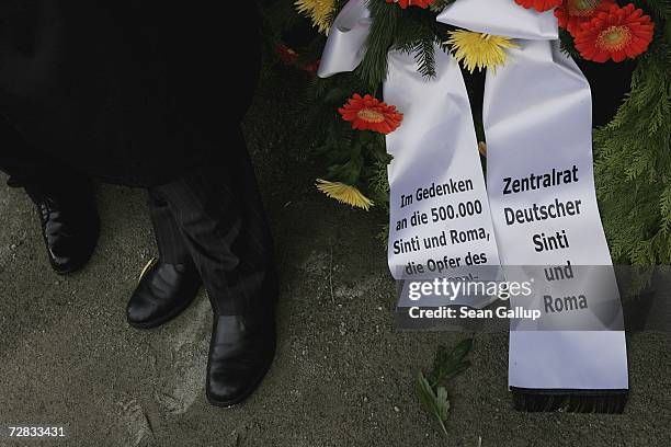 Roma, also known as Gypsy, survivors of the Holocaust attend a ceremony at the former concentration camp at Sachsenhausen December 15, 2006 in...