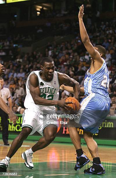Tony Allen of the Boston Celtics heads for the basket as Andre Miller of the Denver Nuggets defends on December 15, 2006 at the TD Banknorth Garden...