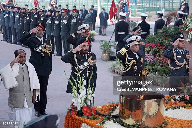 Indian Defence Minister A. K. Antony, Chief of Army J. J. Singh, Chief of the Naval Staff Arun Prakash and Indian Air Force Chief S. P. Tyagi salute...