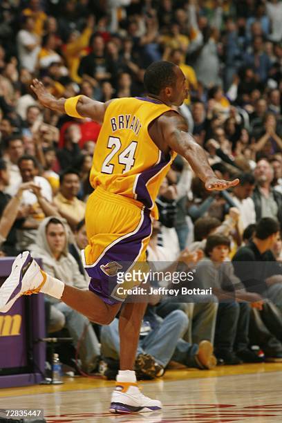 Kobe Bryant of the Los Angeles Lakers "soars" back to his bench after scoring against the Houston Rockets on December 15, 2006 at Staples Center in...