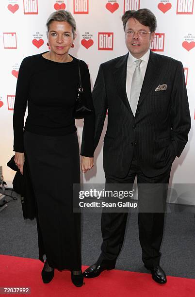 Peter Schwenkow and his wife Inga Griese-Schwenkow attend the Herz fuer Kinder charity gala at Axel Springer Haus December 16, 2006 in Berlin,...