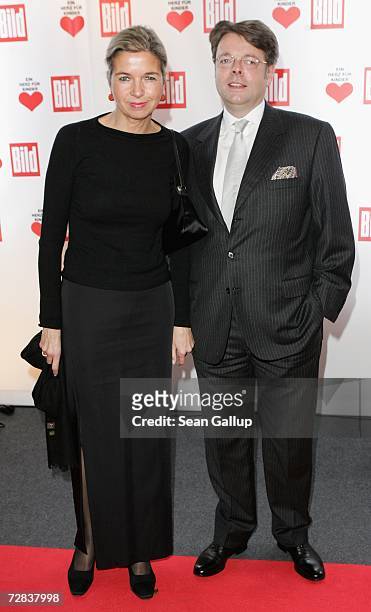 Peter Schwenkow and his wife Inga Griese-Schwenkow attend the Herz fuer Kinder charity gala at Axel Springer Haus December 16, 2006 in Berlin,...