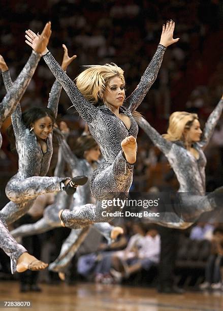 The Heat Dancers perform during a stoppage in play as the Memphis Grizzlies take on the Miami Heat at American Airlines Arena on December 16, 2006 in...