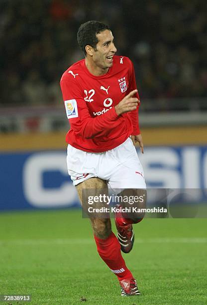 Mohamed Aboutrika of Ahly Sporting Club celebrates after scoring goal during the FIFA Club World Cup Japan 2006 third place play-off match between...