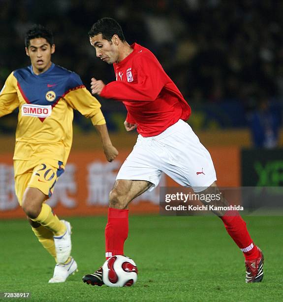 Mohamed Aboutrika of Ahly Sporting Club shoots to score during the FIFA Club World Cup Japan 2006 third place play-off match between Ahly Sporting...