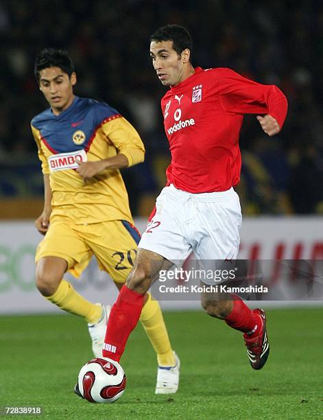 Mohamed Aboutrika of Ahly Sporting Club shoots to score during the FIFA Club World Cup Japan 2006 third place play-off match between Ahly Sporting...