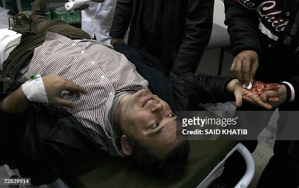 Veteran French journalist working for the French Liberation daily newspaper Didier Francois is treated by medics at the al-Shifa Hospital in Gaza...