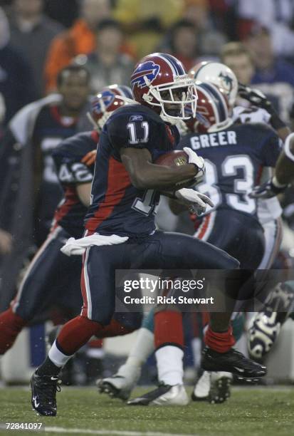 Roscoe Parrish of the Buffalo Bills returns a punt in the fourth quarter against the Miami Dolphins on December 17, 2006 at Ralph Wilson Stadium in...
