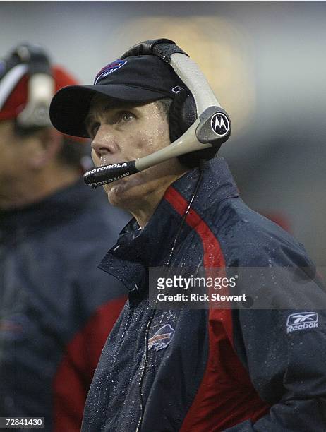 Dick Jauron, head coach of the Buffalo Bills, watches the scoreboard during a game against the Miami Dolphins on December 17, 2006 at Ralph Wilson...