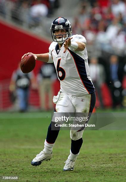 Quarterback Jay Cutler of the Denver Broncos throws a pass on the run against the Arizona Cardinals on December 17, 2006 at University of Phoenix...