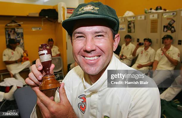 Ricky Ponting captain of Australiaposes with a replica Ashes Urn in the changing rooms after day five of the third Ashes Test Match between Australia...