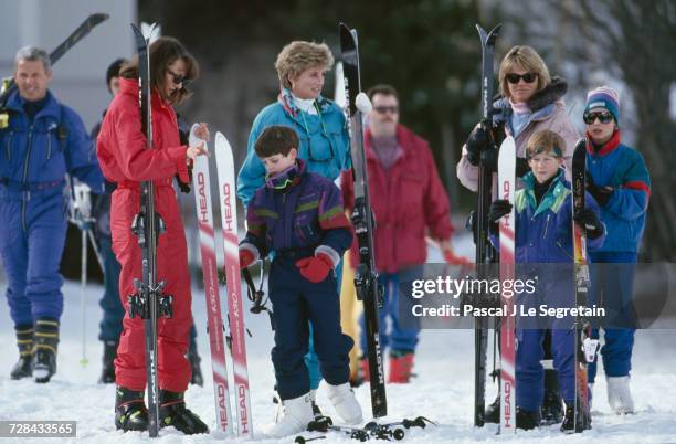 Princess Diana and her sons Prince William and Prince Harry during a skiing holiday in Lech, Austria, 24th March 1994. With them are friends Kate...