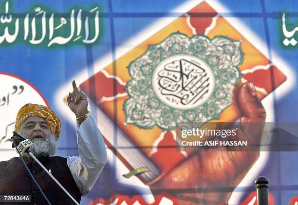 Leader of the six-party religious alliance Muttahida Majlis-e-Amal Maulana Fazal-ur-Rehman addresses a rally in Karachi, 10 December 2006. Around...