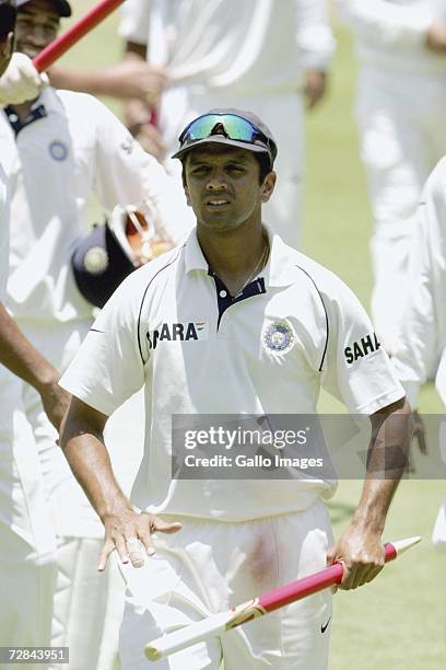 Rahul Dravid takes a stump as he leaves the field after India beat South Africa on day four of the First Test between South Africa and India at the...