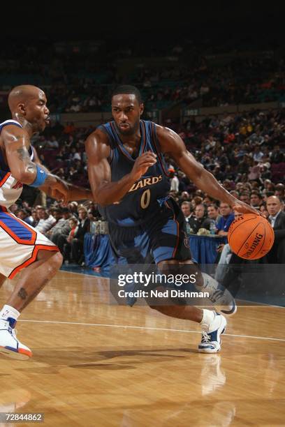 Gilbert Arenas of the Washington Wizards drives against Stephon Marbury of the New York Knicks on November 15, 2006 at Madison Square Garden in New...