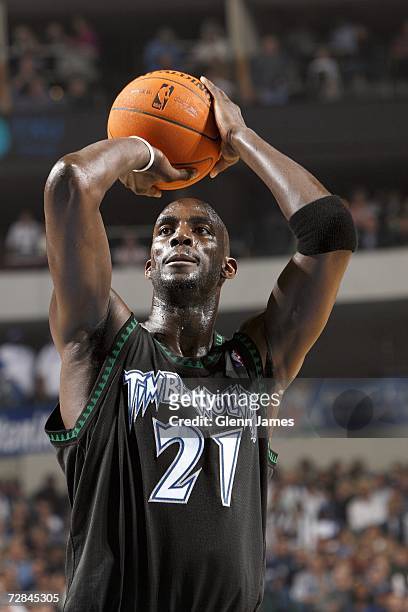 Kevin Garnett of the Minnesota Timberwolves shoots a free throw during the NBA game against the Dallas Mavericks on November 27, 2006 at the American...