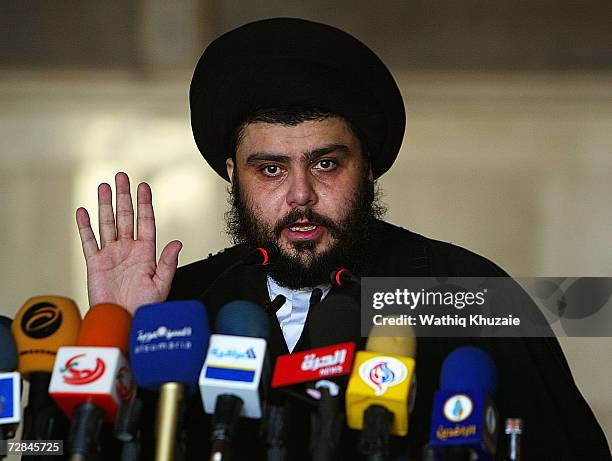 Iraqi radical Shiite cleric Moqtada al-Sadr speaks to his followers on November 24, 2006 during a Friday prayer service held in the city of Kufa...