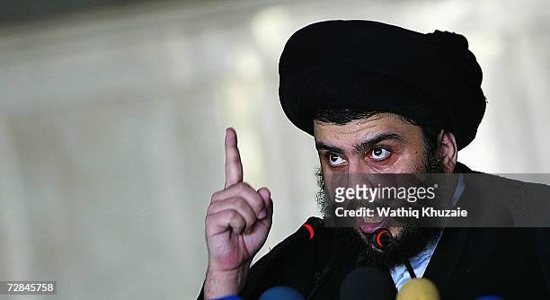 Iraqi radical Shiite cleric Moqtada al-Sadr speaks to his followers on November 24, 2006 during a Friday prayer service held in the city of Kufa...