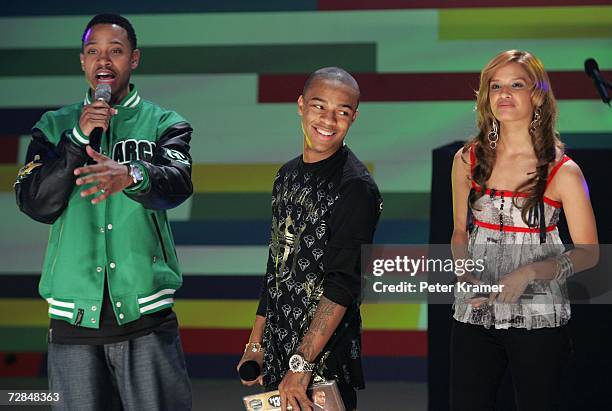 Terrence Jackson, rapper Bow Wow and BET VJ Rocsi make an appearance on BET's "106 & Park" on December 18, 2006 in New York City.