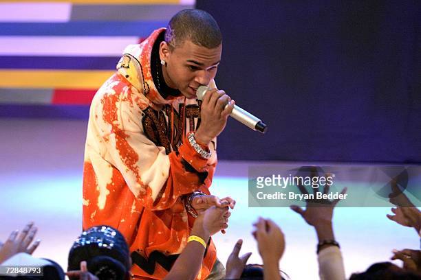 Rapper Chris Brown performs on stage at BET studios during a taping of ''106 & Park'' on December 18, 2006 in New York City.