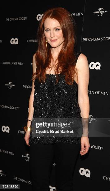 Actress Julianne Moore arrives to the Cinema Society & GQ screening of "Children Of Men" at the Tribeca Grand Screening Room on December 18, 2006 in...