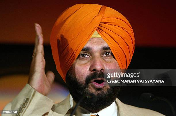 Former Indian cricketer Navjot Singh Sidhu gestures during the launch of an online Mutliplayer cricket game in New Delhi, 19 December 2006. Sidhu, a...
