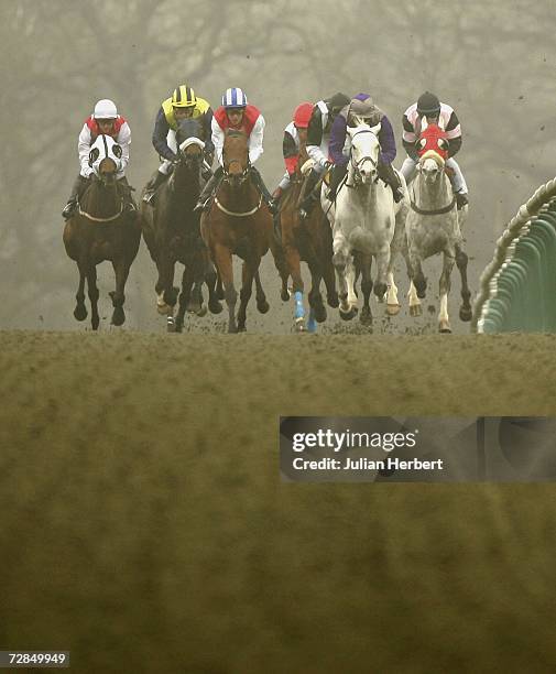 Richard Hughes and Super Frank come down the back straight to land Division One of The Pontins Familly Holidays Handicap Stakes Race run at Lingfield...