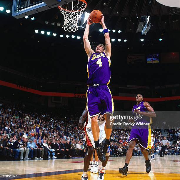 Luke Walton of the Los Angeles Lakers takes the ball to the basket during a game against the Golden State Warriors at the Oracle Arena in Oakland on...