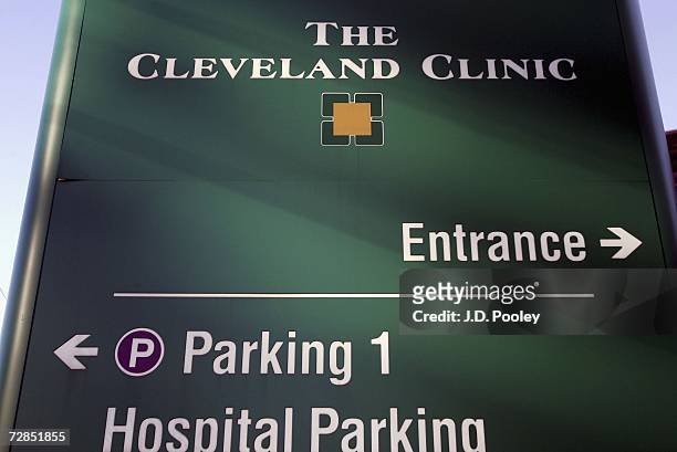 Sign directing visitos to the emergency room stands outside The Cleveland Clinic where Italy's former prime minister Silvio Berlusconi was fitted...