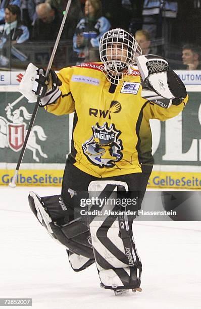 Krefelds goalminder Reto Pavoni celebrates winning the match after the last penalty during the DEL Bundesliga game between the Hamburg Freezers and...