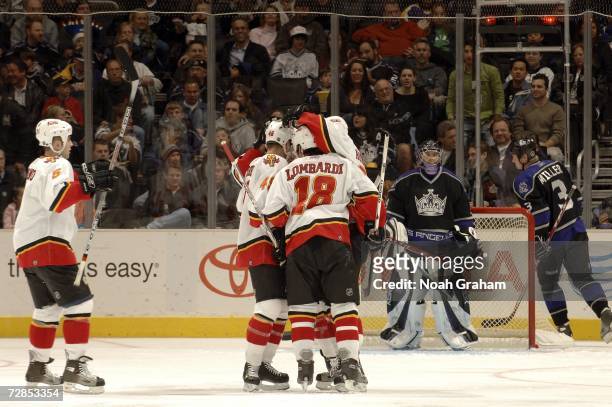 Matthew Lombardi of the Calgary Flames celebrates with teammates after a goal against the Los Angeles Kings at the Staples Center December 19, 2006...