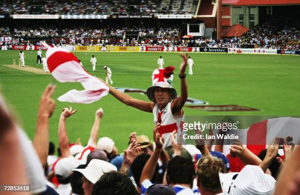 Barmy Army stalwart Vic "Jimmy" Flowers engages the England supporters on "The Hill" at the Adelaide Oval cricket ground during the second Ashes test...