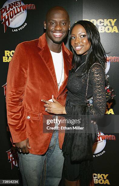 Boxer Antonio Tarver and his fiancee Denise Boothe pose as they arrive at a party following the Las Vegas premiere of the movie "Rocky Balboa" at the...