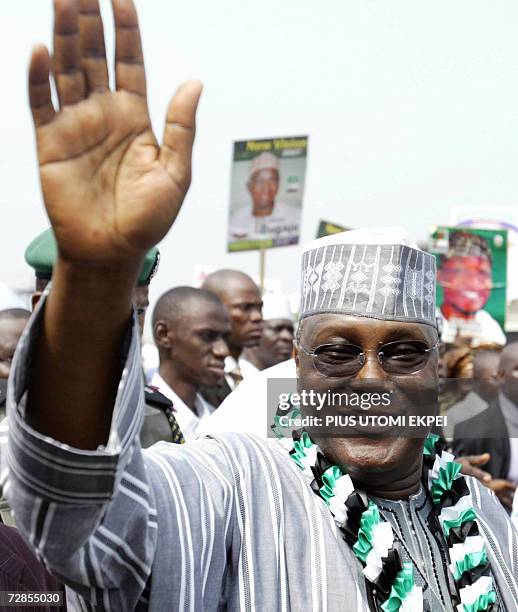 Nigerian Vice President Atiku Abubakar waves at supporters 20 December 2006 upon his arrival in Tafawa Balewa Square in Lagos to seek the...