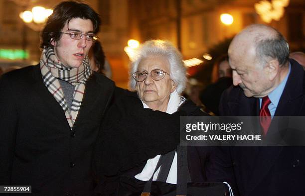 Renee Le Roux and her lawyer Georges Kiejman leave the courthouse of the French Riviera city of Nice, 20 December 2006, on the last day of the trial...