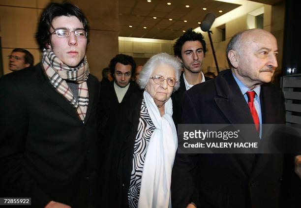 Renee Le Roux and her lawyer Georges Kiejman leave the courthouse of the French Riviera city of Nice, 20 December 2006, on the last day of the trial...