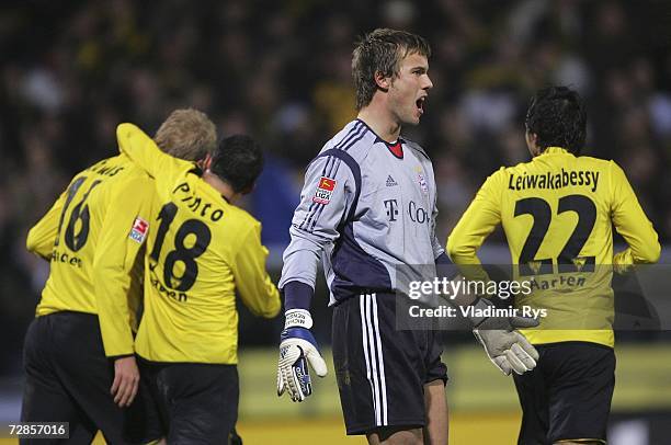 Michael Rensing of Bayern reacts after conceding the third goal from Marius Ebbers of Aachen during the DFB German Cup third round match between...