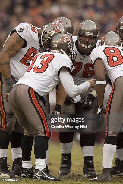 Quarterback Tim Rattay of the Tampa Bay Buccaneers call a play in the huddle during a game against the Chicago Bears at Soldier Field on December 17,...