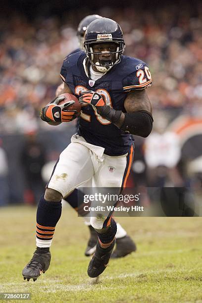 Running back Thomas Jones of the Chicago Bears gets runs with the ball against the Tampa Bay Buccaneers at Soldier Field on December 17, 2006 in...